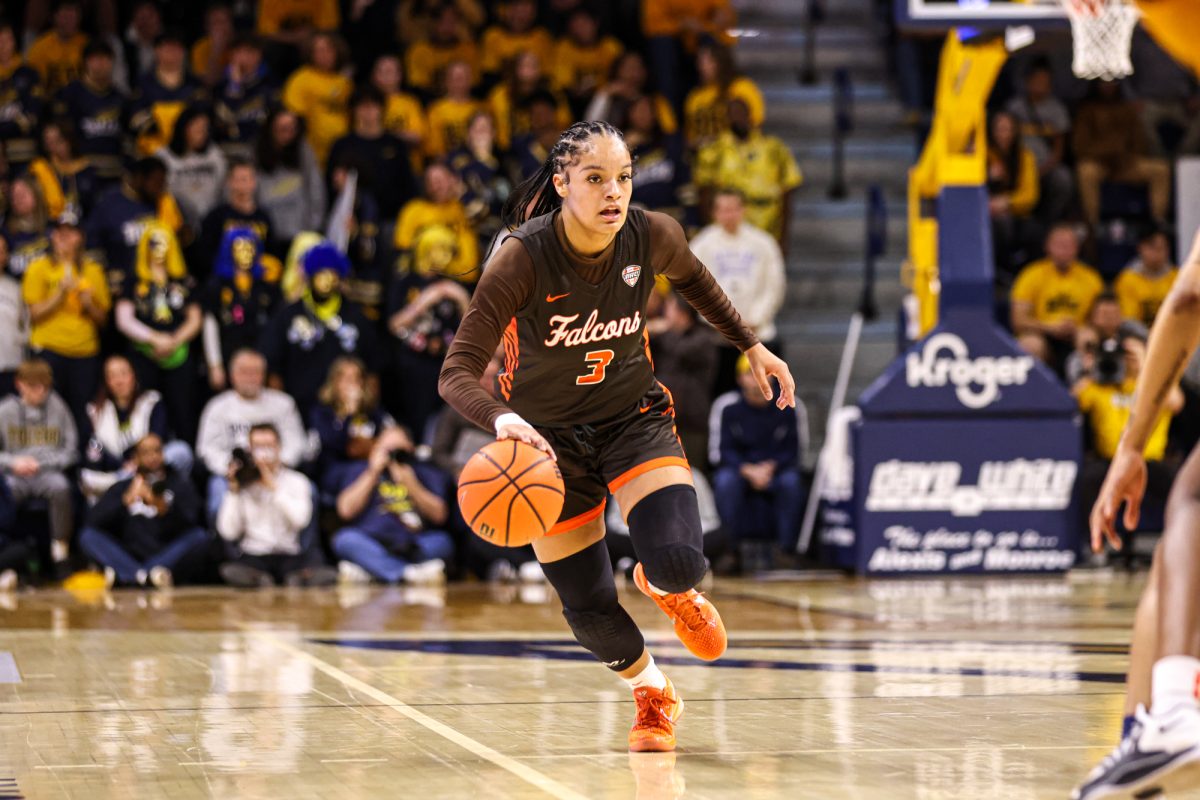 Toledo, OH - Falcons sophomore guard Johnea Donahue (3) drives down the court at the John F. Savage Arena in Toledo, Ohio.