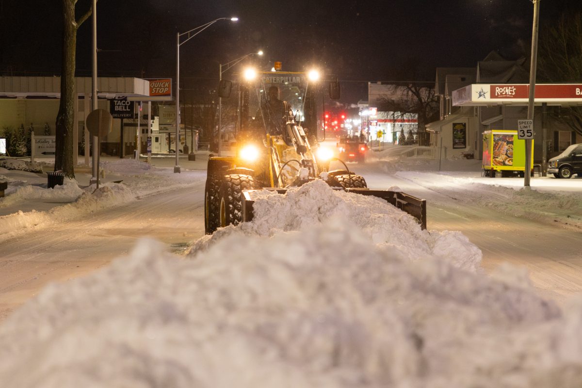 Bowling Green, OH - City of Bowling Green crews work into the night removing snow from roads in Bowling Green, Ohio on January 25, 2026.