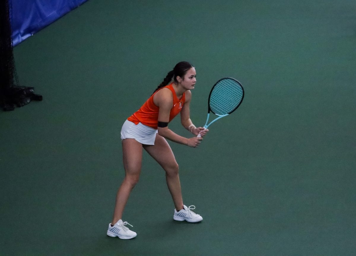 Perrysburg, OH - Falcons freshman Kiera Taylor prepares to return a serve at the Perrysburg Tennis Center in Perrysburg, Ohio.