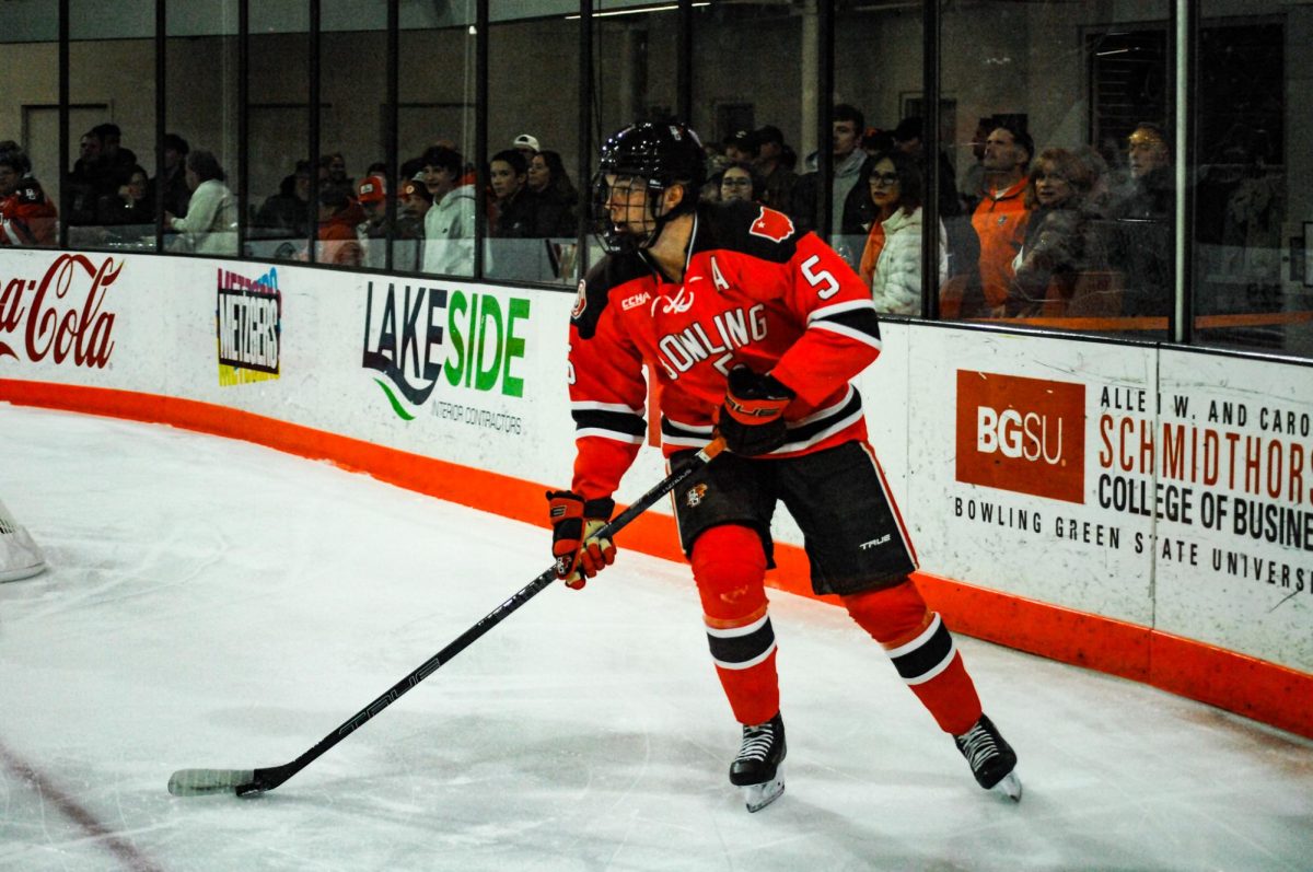 Bowling Green, OH - Falcons junior defender Gustav Stjernberg (5) handles the puck during a game between the Notre Dame Fighting Irish and the Bowling Green Falcons at the Slater Family Ice Arena.