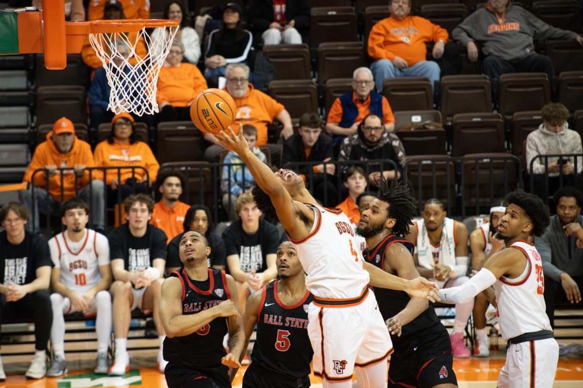 Bowling Green, OH - Falcons sophomore guard Josiah Shackelford attempting a layup during a game between the Bowling Green Falcons and the Ball State Cardinals at the Stroh Center in Bowling Green, Ohio.