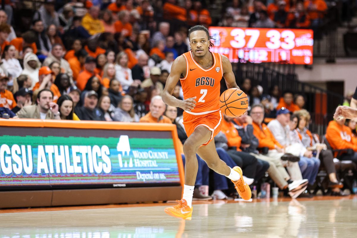 Bowling Green, OH - Falcons senior guard Javontae Campbell (2) runs down the court with the ball against the Toledo Rockets at the Stroh Center in Bowling Green, Ohio.