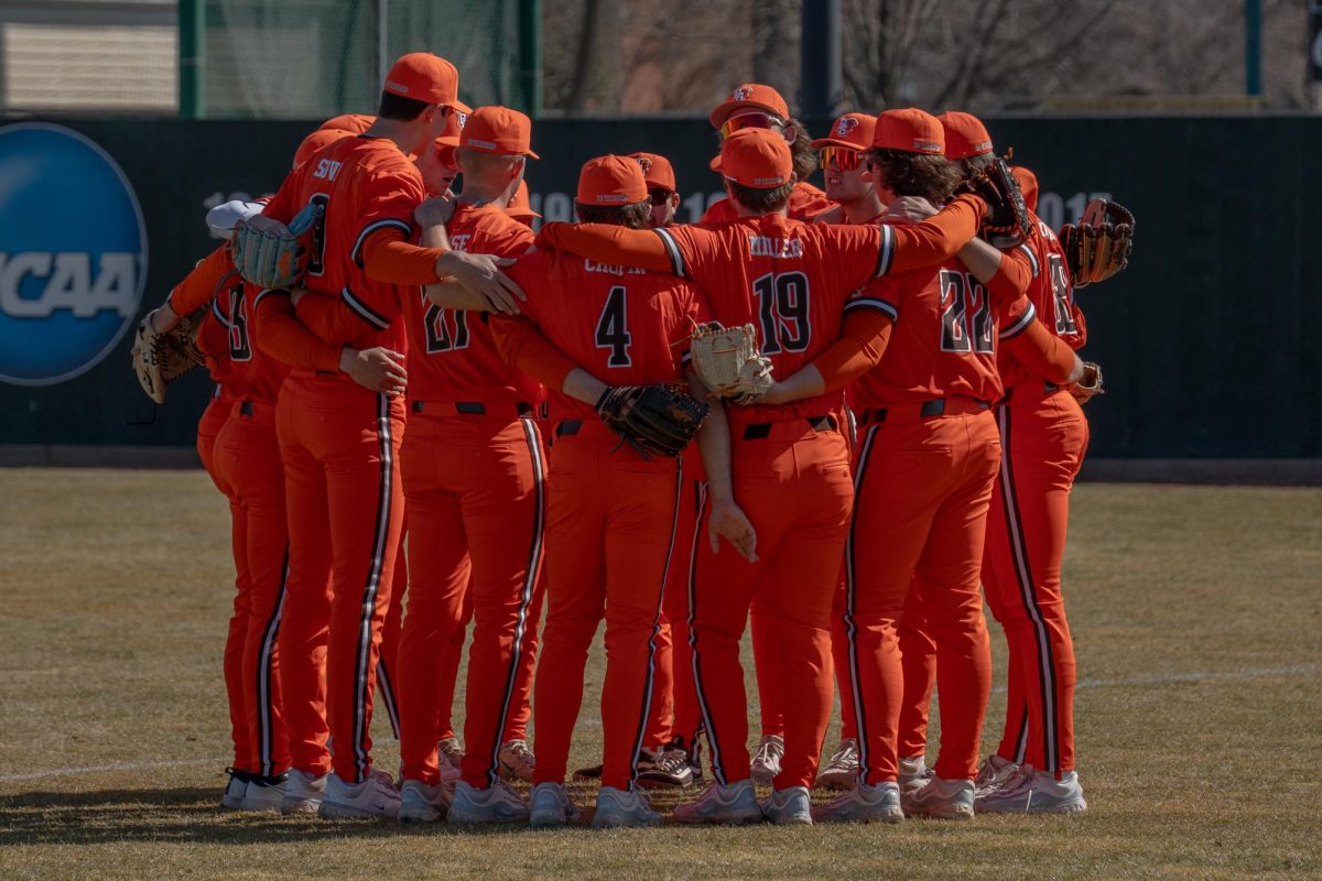 Athens, OH - Falcons huddle in a circle before facing the Ohio Bobcats at Bob Wren Stadium on March 9.