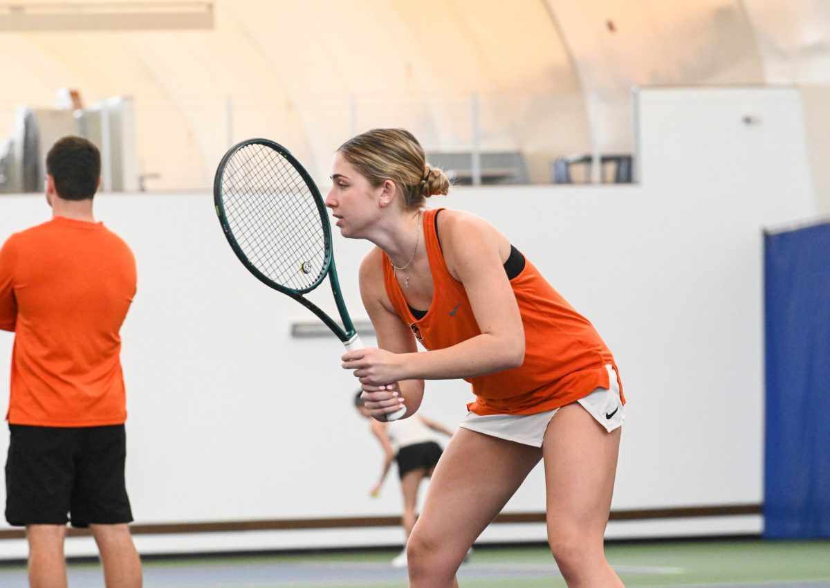 Perrysburg, OH - Falcons junior Brynn Chaffee preparing for the serve at the Perrysburg Tennis Center in Perrysburg, Ohio.