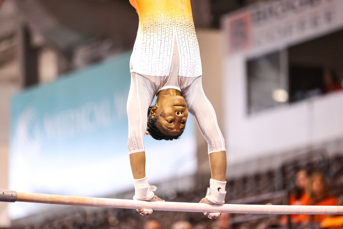 Bowling Green, OH - Falcons sophomore Kayla Shaw performs her bars routine at the Stroh Center in Bowling Green, Ohio.