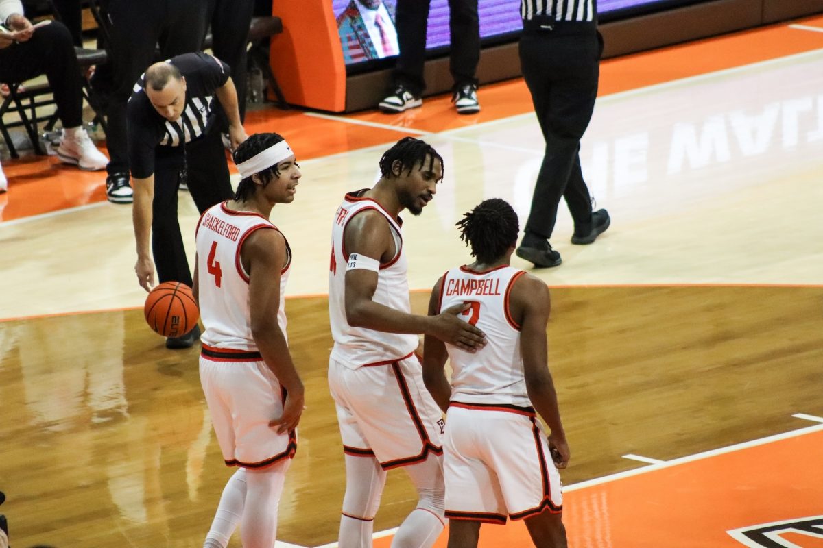 Bowling Green, OH - Falcons senior forward Troy Glover II (14) talks with his teammates at the Stroh Center in Bowling Green, Ohio.