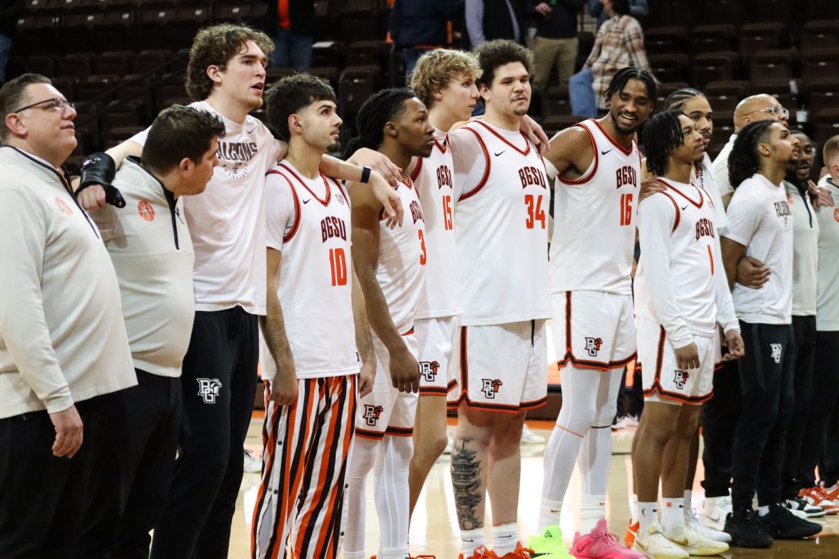 Bowling Green, OH - The BGSU Men's Basketball team celebrates a victory at the Stroh Center in Bowling Green, Ohio.