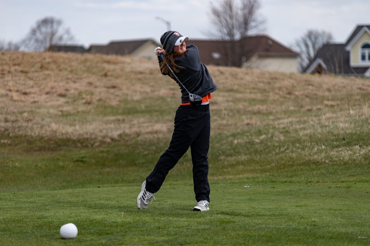 Bowling Green, OH - Falcons sophomore golfer Sammie Dolce fires a drive towards the fairway at Stone Ridge Golf Course in Bowling Green, Ohio.