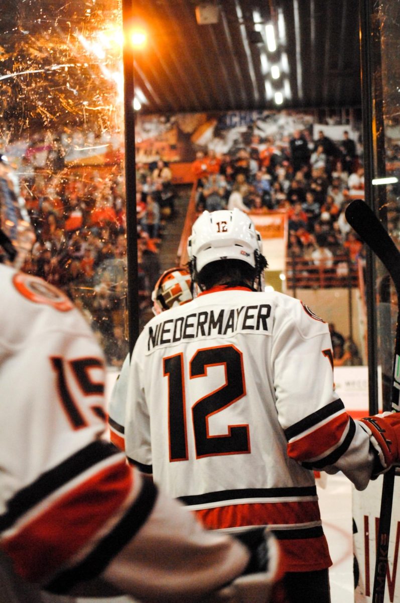 Bowling Green, OH - Falcons senior defenseman Jackson Niedermayer (12) steps onto the ice during a game between the Minnesota State Mavericks and the Bowling Green Falcons at the Slater Family Ice Arena in Bowling Green, Ohio.