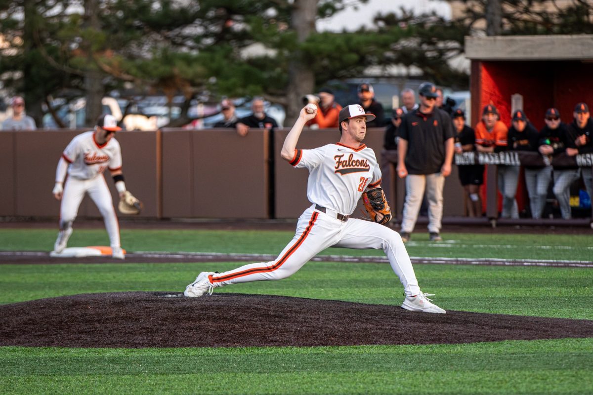 Bowling Green, OH - Falcons freshman infielder Griffin Scheiderer (18) sprints up the third-base line to score a run during a game between the Findlay Oilers and the Bowling Green Falcons at Stellar Field in Bowling Green, Ohio.