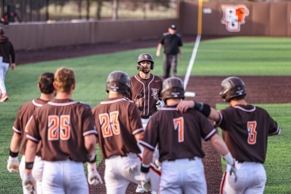 Bowling Green, OH - Falcons senior infielder Sam Seidel (21) jogs home after hitting a grand slam at Steller Field in Bowling Green, Ohio.
