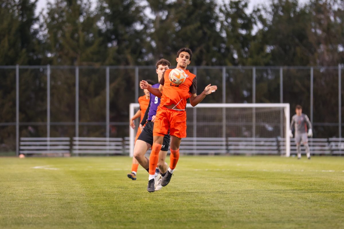 Bowling Green, OH - Falcons sophomore midfielder Caue Ramos (23) bumps the ball with his chest at Cochrane Stadium in Bowling Green, Ohio.