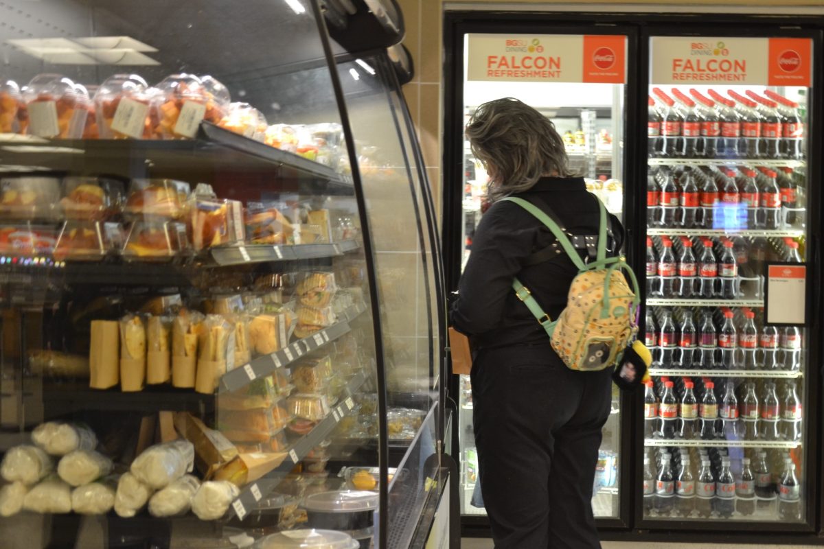 Bowling Green, OH- Participant of Animarathon looking at food options presented by BGSU dining in the Bowen Thompson Student Union in Bowling Green, Ohio.
