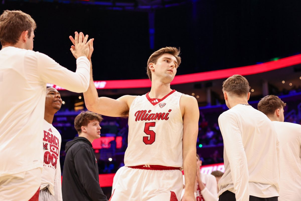 Cleveland, OH - RedHawks senior guard Peter Suder (5) is introduced during the men's MAC Basketball Tournament at Rocket Arena in Cleveland, Ohio.