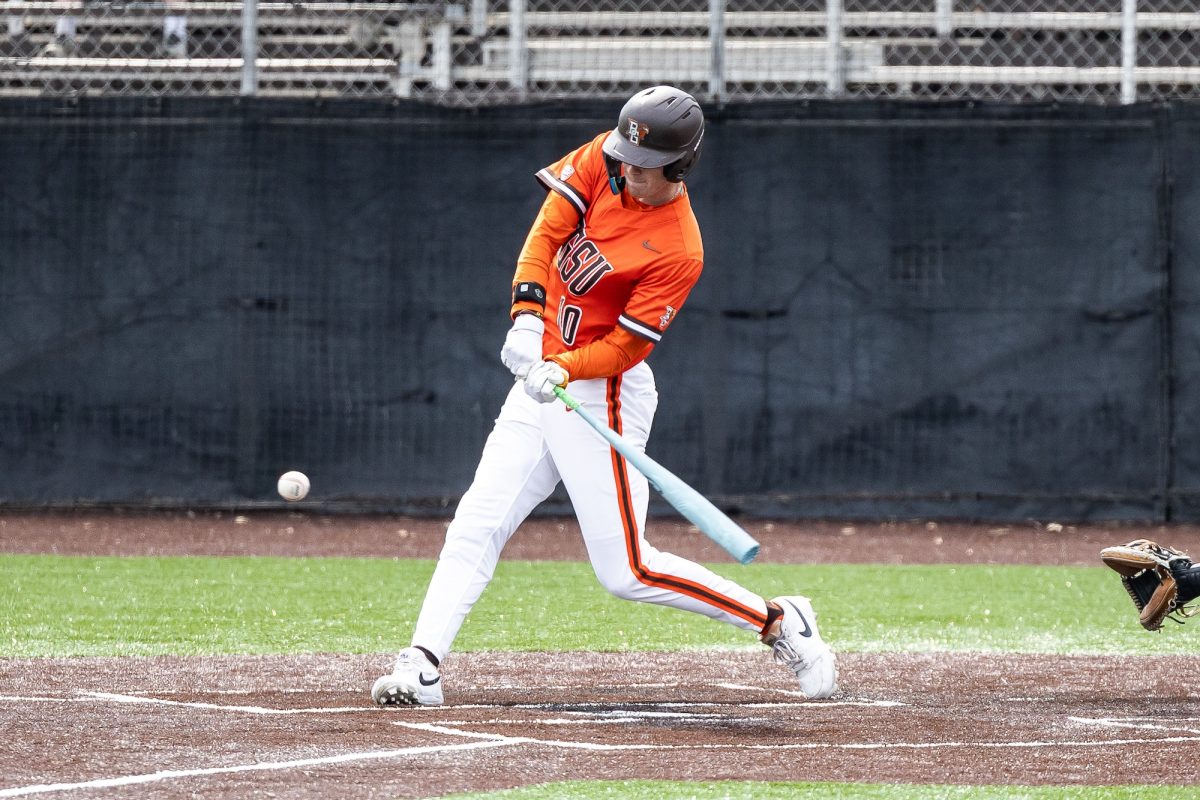 Bowling Green, OH - Falcons junior first baseman/outfielder TJ Takats (10) swings at a low fastball during a game between the Ohio Bobcats and the Bowling Green Falcons in Bowling Green, Ohio.