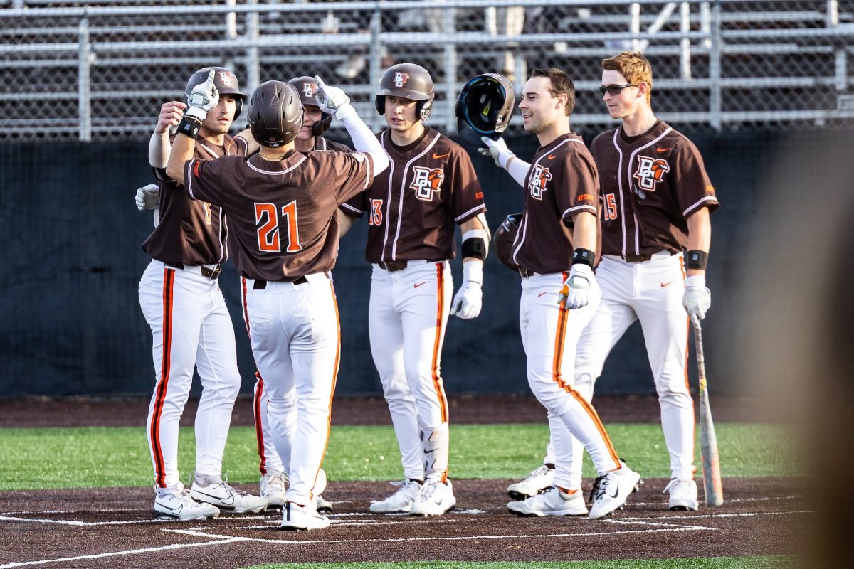 Bowling Green, OH - Falcons senior infielder Sam Seidel (21) points to the sky after hitting a grand slam during a game between the Ohio Bobcats and the Bowling Green Falcons at Steller Field, in Bowling Green,  Ohio.