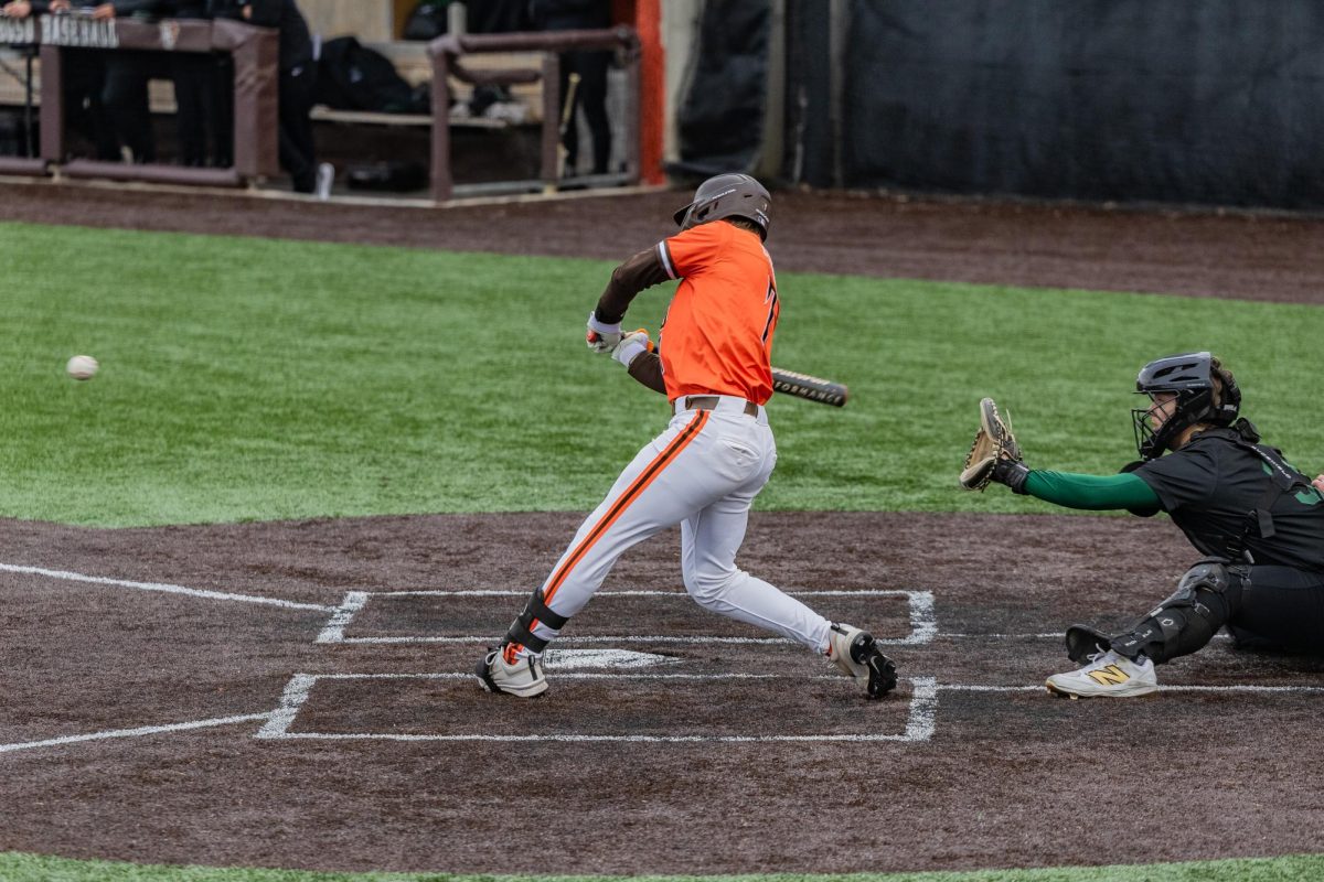 Bowling Green, OH - Falcons sophomore infielder Brayden Curlis (7) ropes a walk-off single during a game between the Tiffin Dragons and the Bowling Green Falcons at Stellar Field in Bowling Green, Ohio.