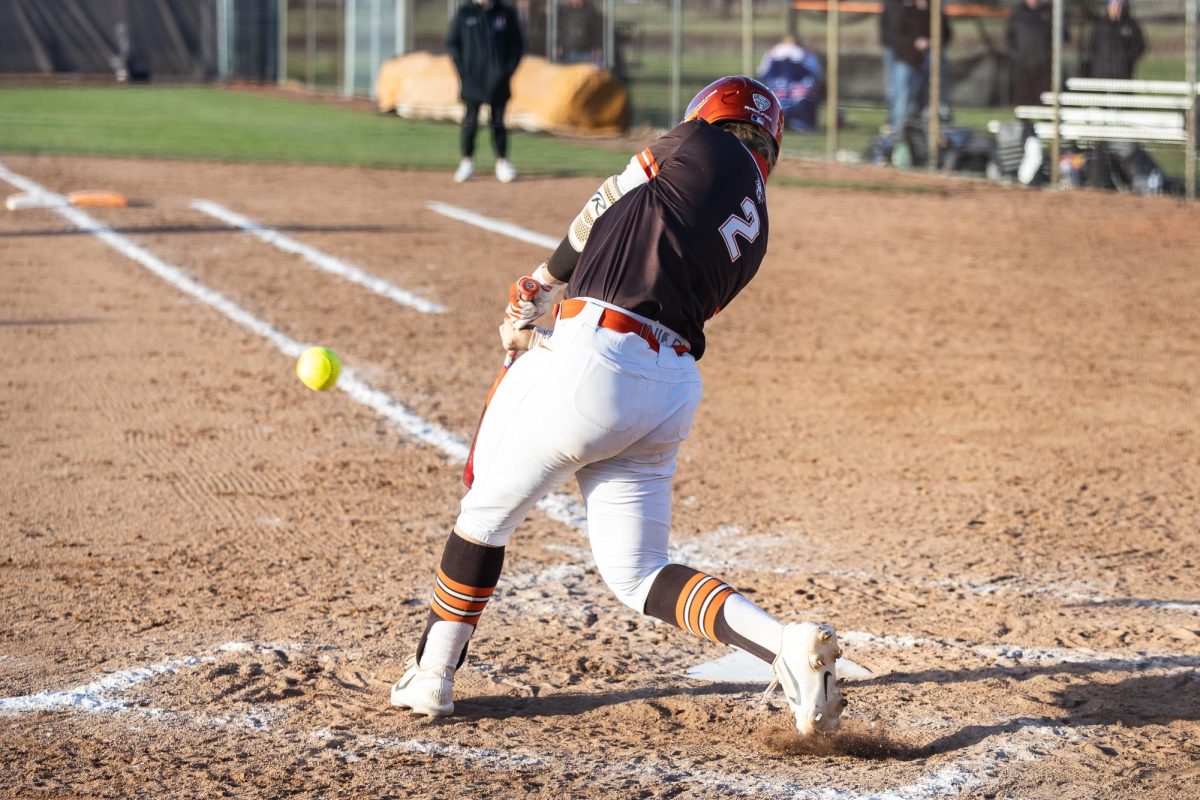 Bowling Green, OH - Falcons senior middle infielder Hannah Hunt (2) mashes a three-run homerun during a game between the Buffalo Bulls and the Bowling Green Falcons at Meserve Field in Bowling Green, Ohio.