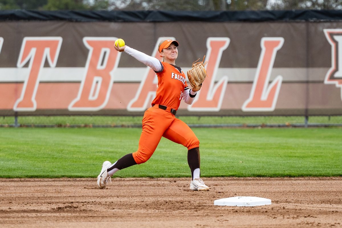 Bowling Green, OH - Falcons junior shortstop Cameron Kaufman (12) throws to first on a ball up the middle during a game between the Buffalo Bulls and the Bowling Green Falcons at Meserve Field in Bowling Green, Ohio.