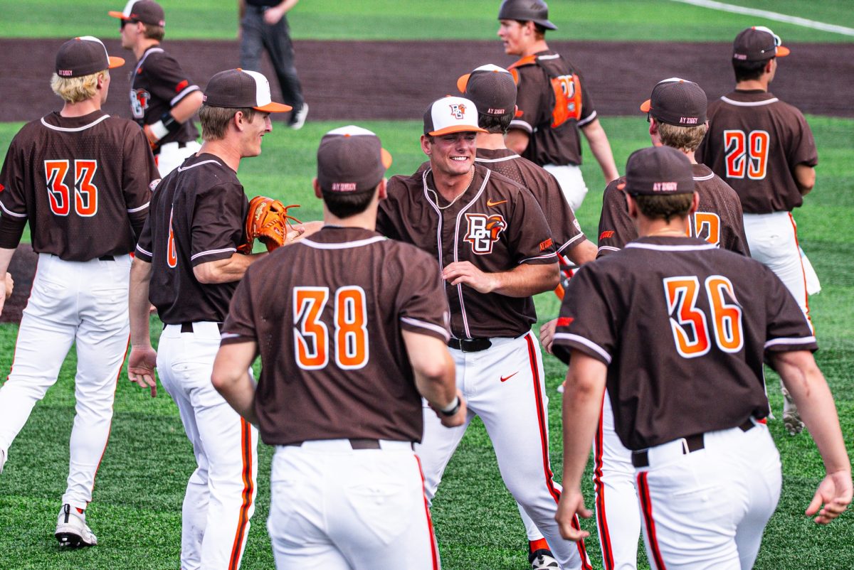 Bowling Green, OH - Falcons Redshirt sophomore pitcher Titus Lotz (26) celebrating with the Falcons after securing the win during a game between the Akron Zips and the Bowling Green Falcons at Stellar Field in Bowling Green, Ohio.