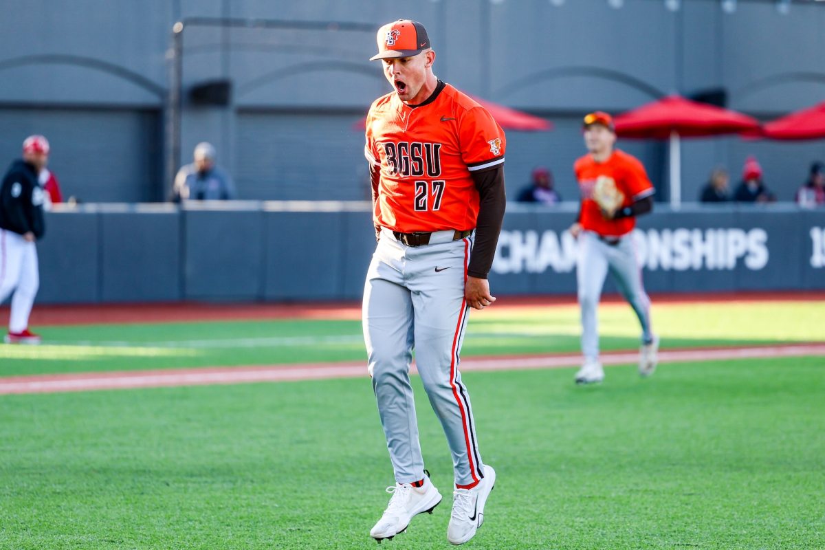 Columbus, OH - Falcons senior pitcher Luke Krouse (27) comes off the mound screaming after catching a comebacker at Bill Davis Stadium in Columbus, Ohio.