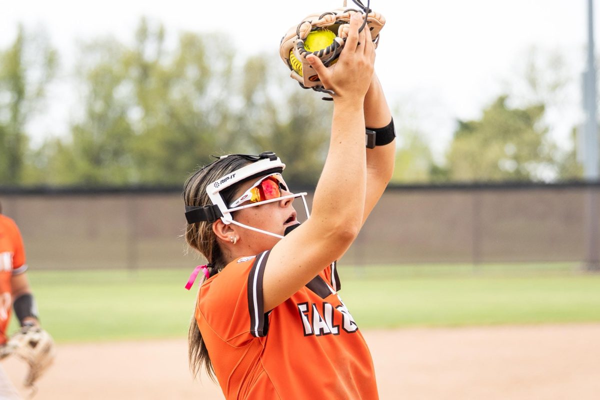 Bowling Green, OH - Falcons junior infielder Taylor Behrendt (9) catches a pop-fly during a game between the Massachusetts Minutewomen and the Bowling Green Falcons at Meserve Field in Bowling Green, Ohio. 