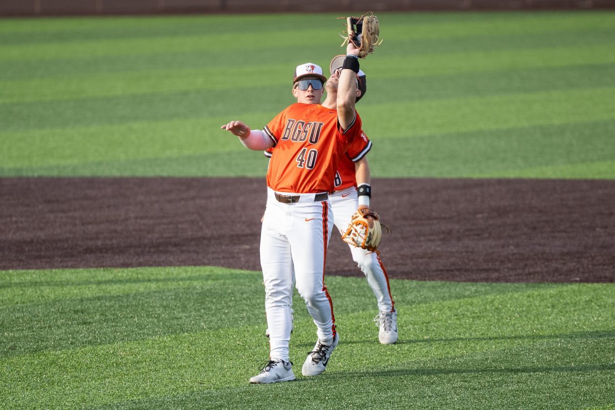 Bowling Green, OH - Falcons senior infielder Anthony Mitta (40) ranges forward to catch a fly ball at Steller Field, in Bowling Green, Ohio.