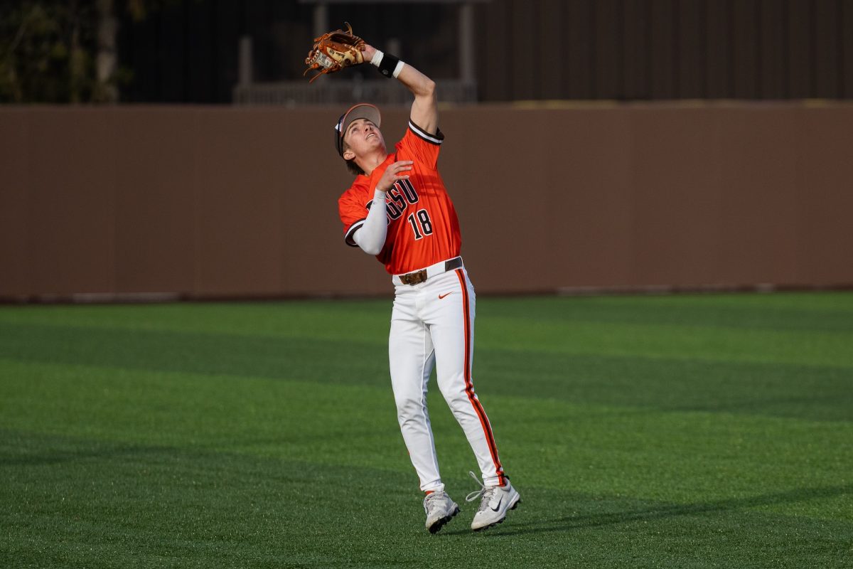 Bowling Green, OH - Falcons freshman infielder Griffin Scheiderer (18) ranges into the outfield for a fly ball at Steller Field, in Bowling Green, Ohio.