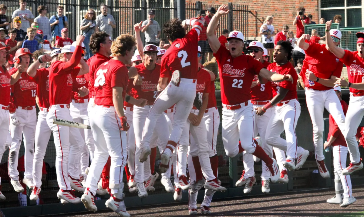 The Miami RedHawks celebrating in there win over Michigan