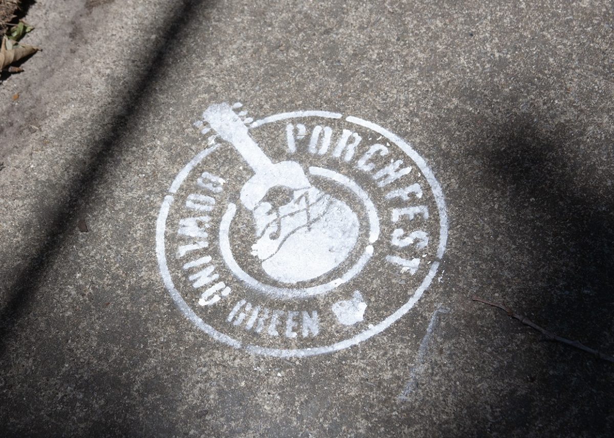 Spray painted Porchfest logos marked the sidewalks. 